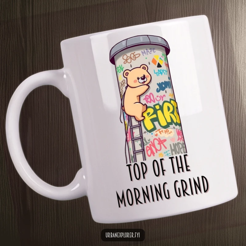 Funny Kawaii bear determinedly climbing a tall, graffiti-covered water tower, seeking adventure on this unique mug. A humorous and inspiring design.