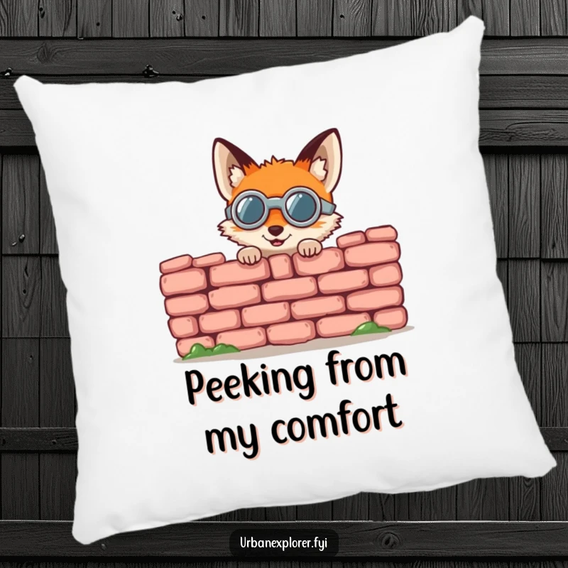 Funny fox pillow, a round fox in goggles gleefully peeking from behind a crumbling brick wall, a soft decorative item.