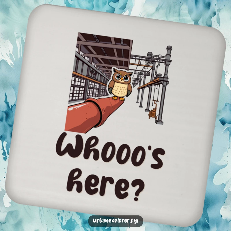 Cheerful owl perched on a rusty pipe in an industrial complex sits on a drink coaster, adding humor.