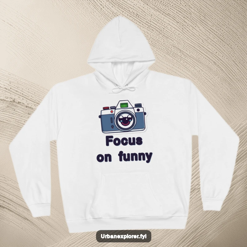 Funny retro camera with surprised cartoon eyes on a cozy hoodie, perfect for photographers and vintage lovers seeking humor.