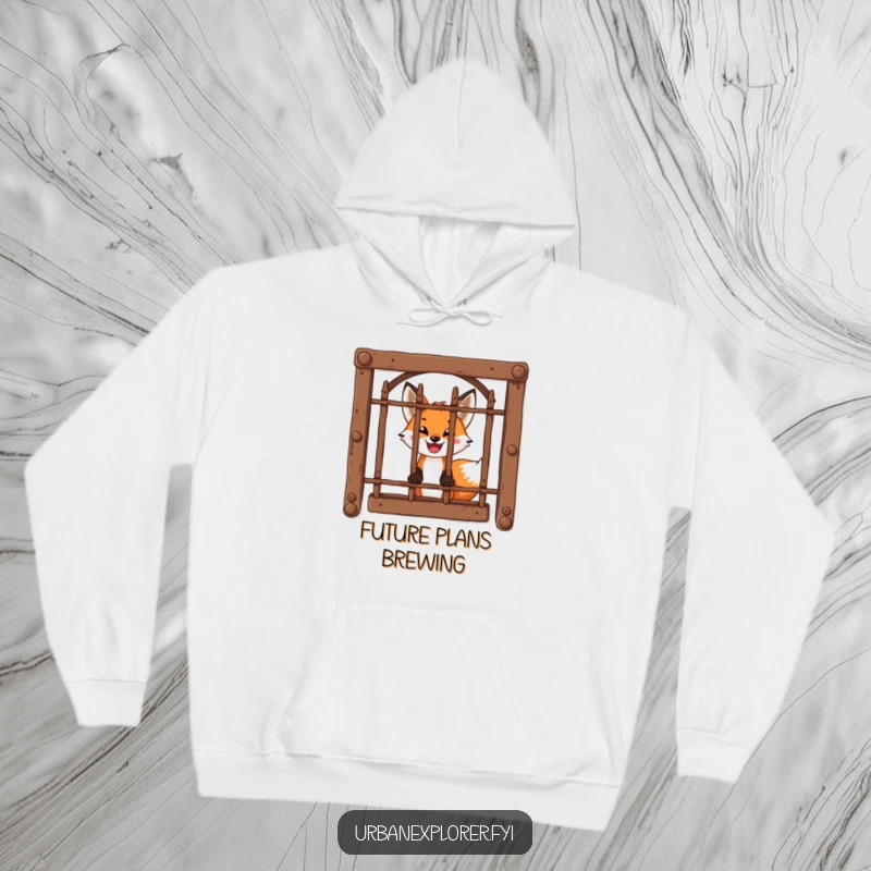 Funny Hoodie: A brave fox with a wide smile peeks curiously through a barred window, exuding charm.