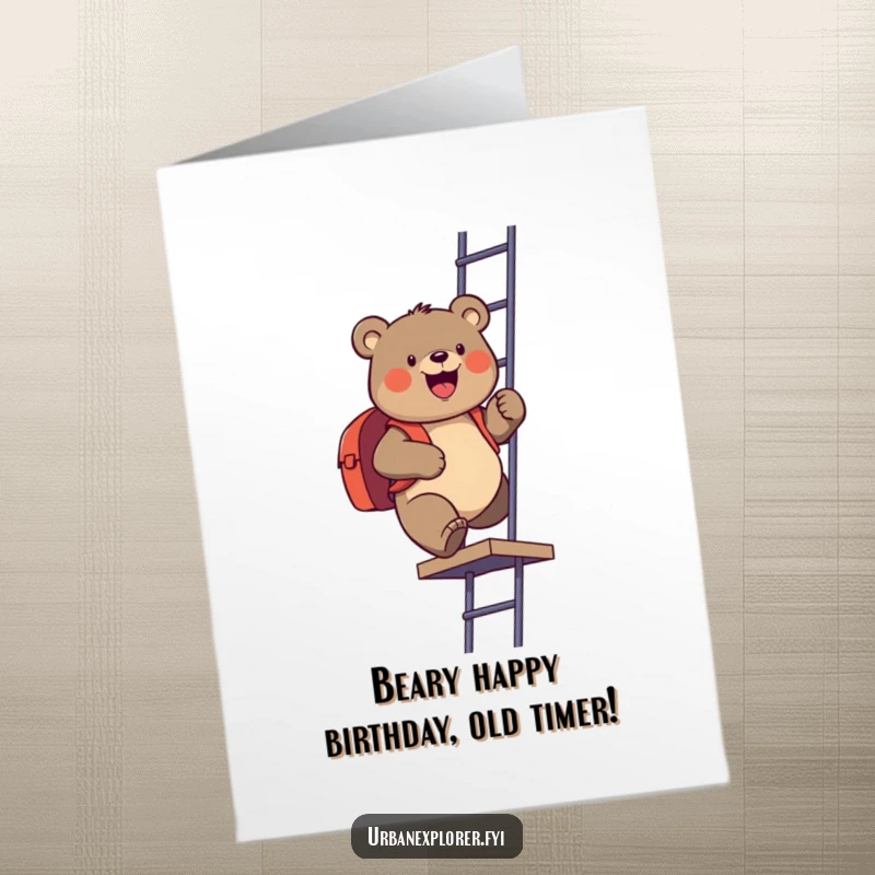 Funny Free Printable Birthday Card: A gleeful bear with a backpack climbing a fire escape, ready for adventure, a unique DIY gift.